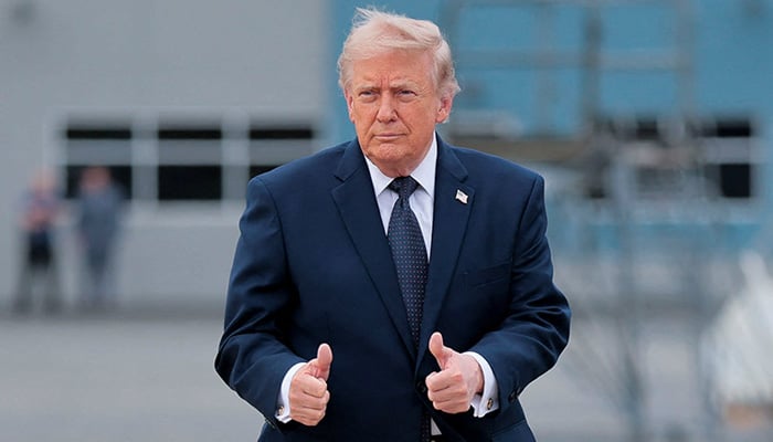 US President Donald Trump gestures as he leaves Marine One to board Air Force One en route to Joint Base Andrews, Maryland, as he departs Morristown Airport in Morristown, New Jersey, US, May 22, 2026. — Reuters
