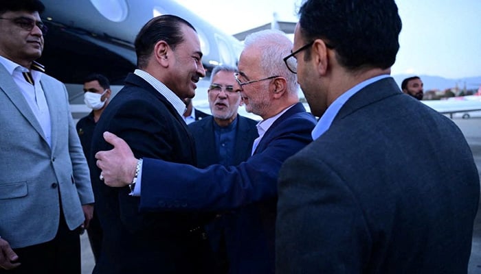 Chief of Defence Forces and Chief of Army Staff Field Marshal Asim Munir is welcomed by Iranian Interior Minister Eskandar Momeni upon his arrival as a part of the ongoing mediation efforts between the US and Iran in Tehran on May 22, 2026. — ISPR