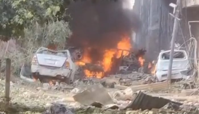 Smoke rises from a car after blast in Quetta on May 24, 2026. — Truth Wire