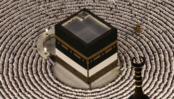 Muslims perform the evening prayer around the Kaaba, at Grand Mosque complex on May 24, 2026, ahead of the annual Hajj pilgrimage. — AFP