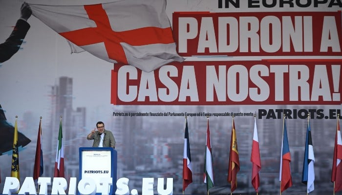 Italys Deputy Prime Minister and leader of the Lega party, Matteo Salvini, speaks on stage at Piazza Duomo during a rally organised by the Patriots for Europe group (PfE) at the European Parliament and titled Without Fear: in Europe, masters in our own home, in Milan, Italy, on April 18, 2026. — AFP