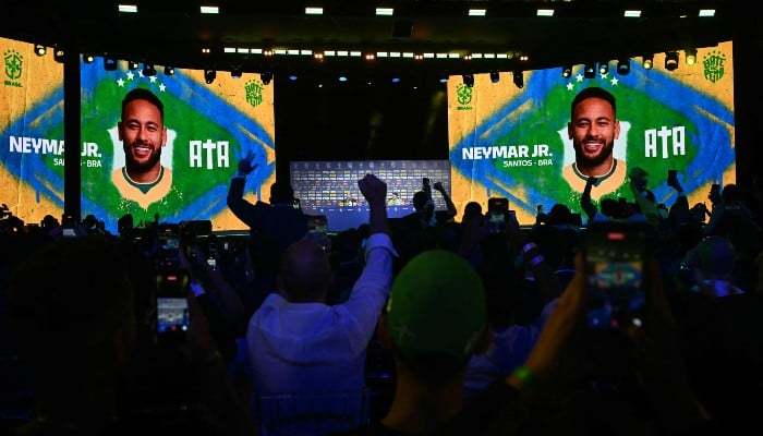 People celebrate after the announcement of Brazilian footballer Neymar Jr. during an event to announce Brazils squad for the 2026 FIFA World Cup at the Museum of Tomorrow, in downtown Rio de Janeiro, Brazil, on May 18, 2026. — AFP