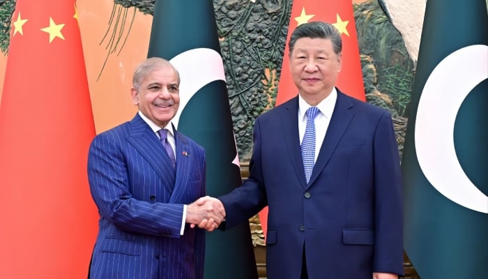 Prime Minister Shehbaz Sharif shakes hand with Chinese President Xi Jinping in Bejing, China on May 25, 2026. — X@CMShehbaz