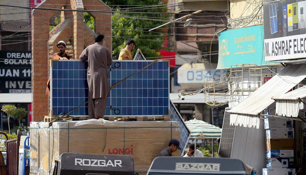 People purchase solar system for power generation in Karachi, on July 12, 2025. — PPI
