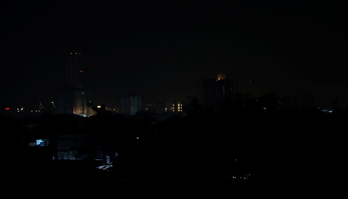A view shows buildings during a power breakdown in Karachi. — Reuters