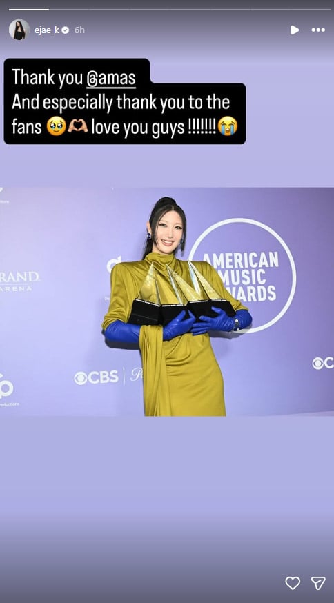 Golden hitmaker EJAE strikes pose with four trophies after AMAs win
