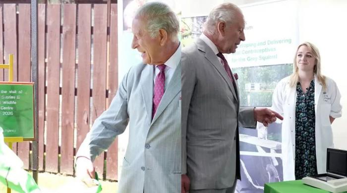 King Charles hugs patients during visit to cancer centre