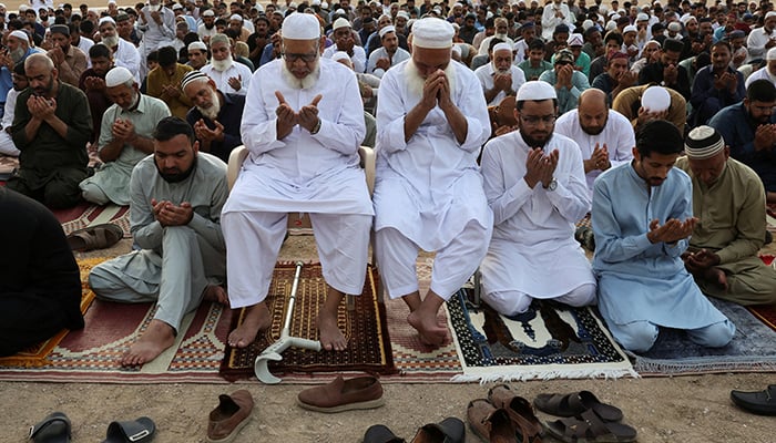 People offer Eid ul Adha prayers at the Railway Ground in Karachi, May 27, 2026. — Reuters