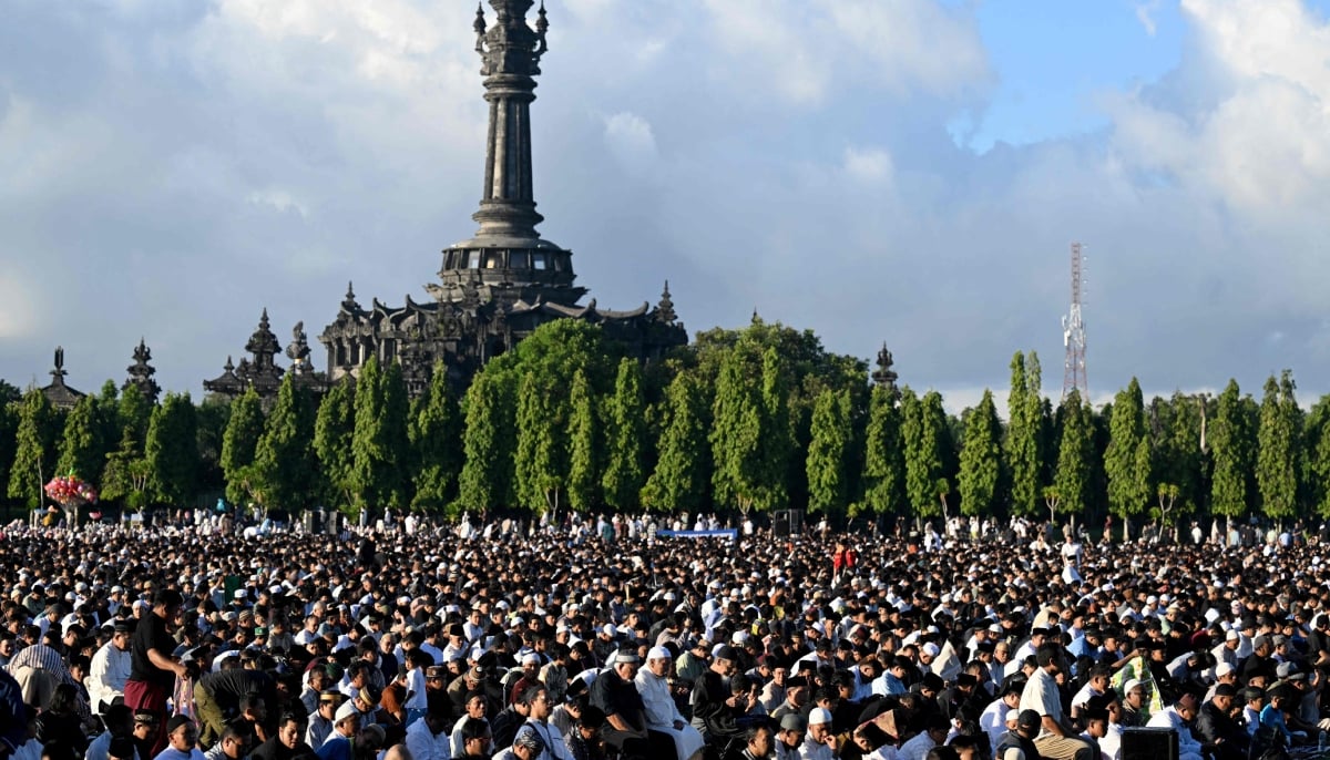 Muslim worshippers offer prayers for Eid ul Adha, or Feast of Sacrifice, in Denpasar, on Indonesia´s resort island of Bali on May 27, 2026. — AFP
