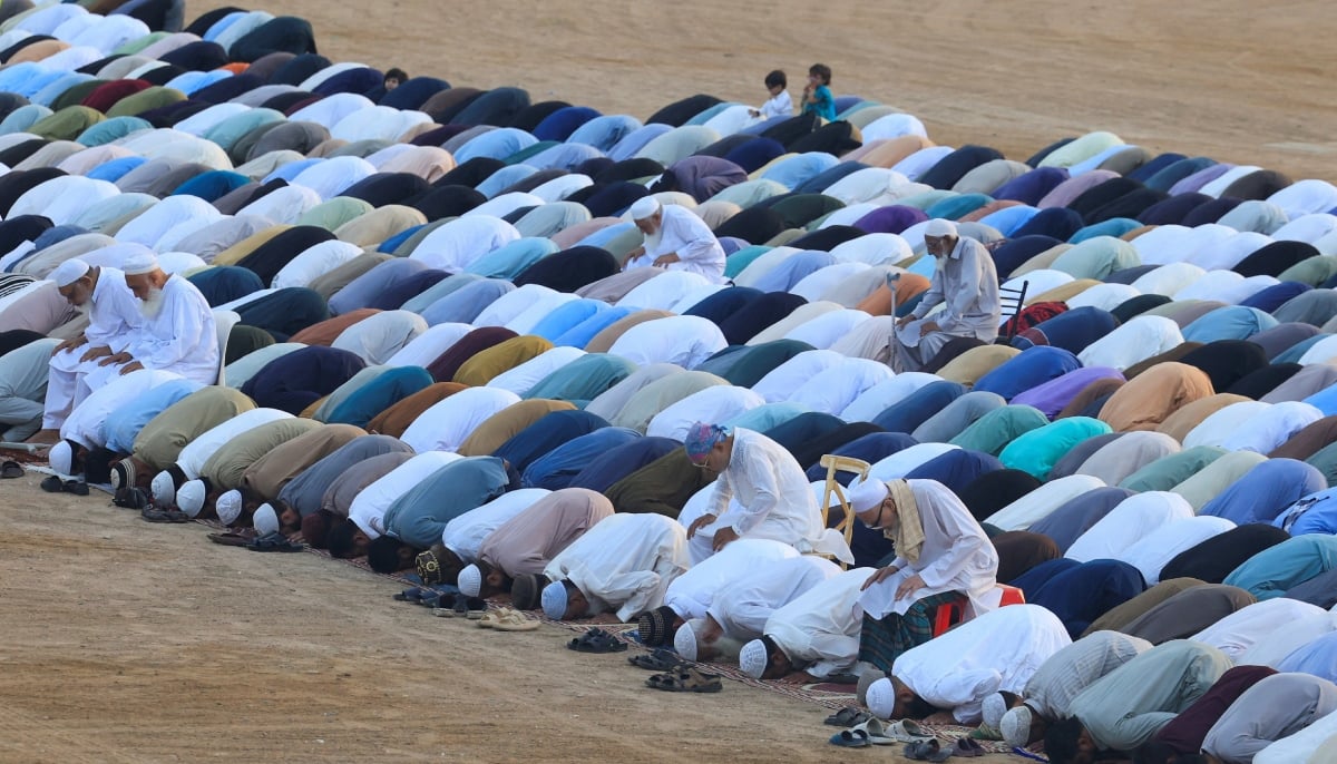 People offer Eid ul Adha prayers at the Railway Ground in Karachi, , May 27, 2026. — Reuters