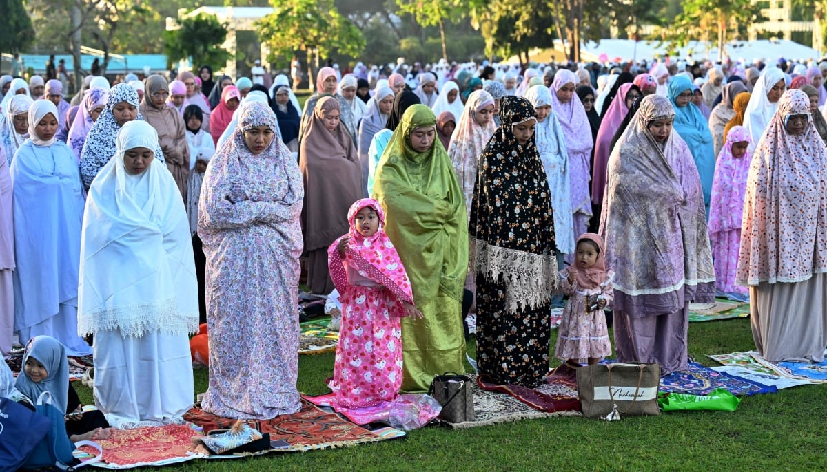 11.	 Muslim worshippers offer prayers for Eid ul Adha, or Feast of Sacrifice, in Denpasar, on Indonesia´s resort island of Bali on May 27, 2026. — AFP
