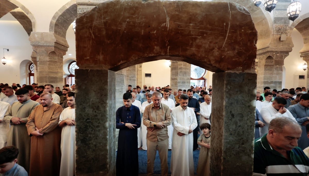 Muslim worshippers attend Eid ul Adha prayer in Mosul, Iraq, May 27, 2026. — Reuters