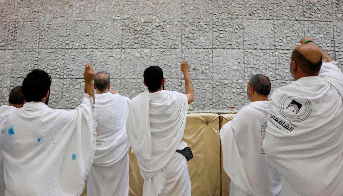 Muslim pilgrims perform the symbolic stoning of the devil ritual as part of the Hajj pilgrimage in Mina on May 27, 2026. — AFP