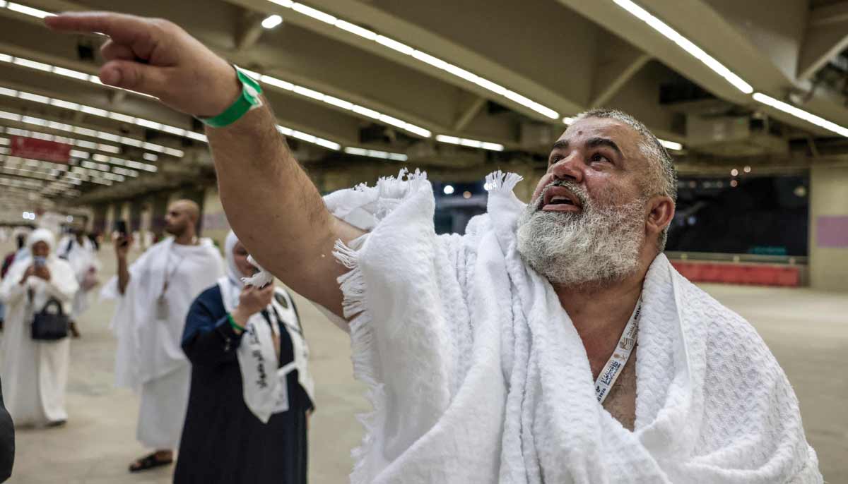 A pilgrim performs the symbolic stoning of the devil ritual as part of the Hajj pilgrimage in Mina on May 27, 2026. — AFP