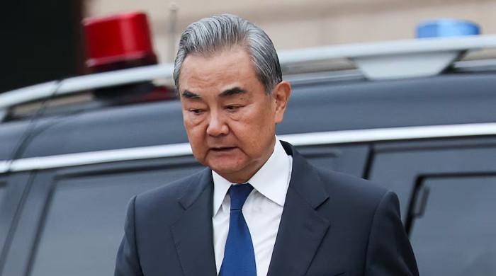 China's top diplomat says hopes US, Iran reach compromise