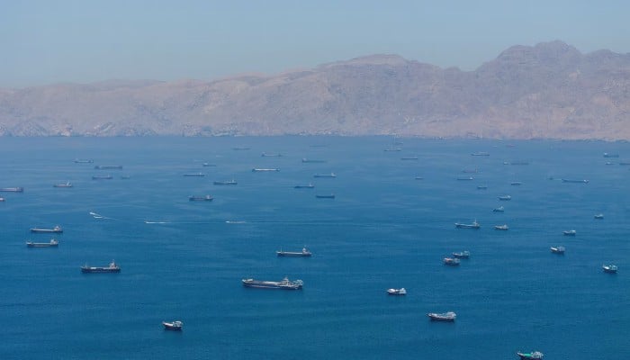 A drone view shows vessels anchored at the Strait of Hormuz, as seen from Musandam, Oman, May 25, 2026. — Reuters