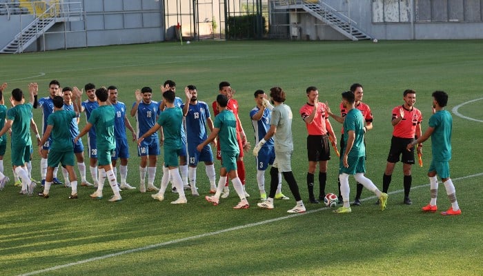 Irans players arrive for a training session as part of the teams preparation for the upcoming football World Cup at the Iranian national teams base camp in Antalya on May 26, 2026. — AFP