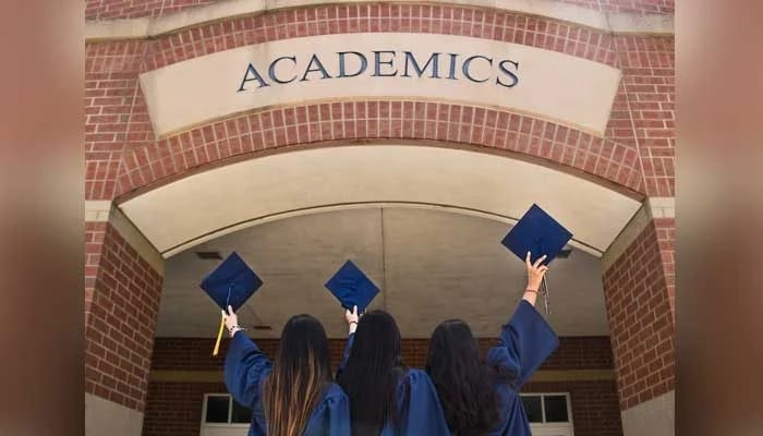 Students pose at their graduation in this representational image. — Unsplash/File