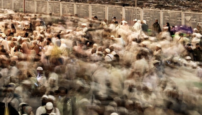 Pilgrims make their way to perform the symbolic stoning of the devil during their Hajj pilgrimage in Mina on May 28, 2026. — AFP