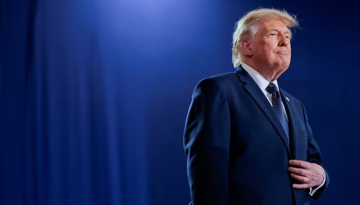 US President Donald Trump stands on the stage on the day of delivering remarks at Rockland Community College in Suffern, New York, US, May 22, 2026. — Reuters