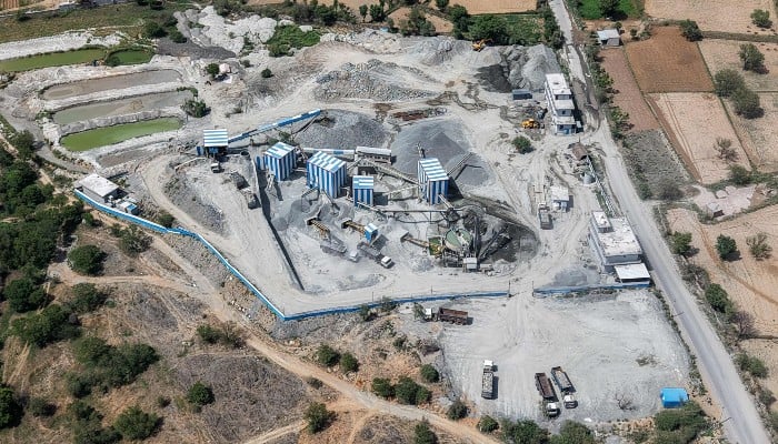 This aerial photograph taken on May 19, 2026, shows a stone-crushing plant near a quarry in the Aravalli mountain range in Rajasthan´s Neem ka Thana town. — AFP