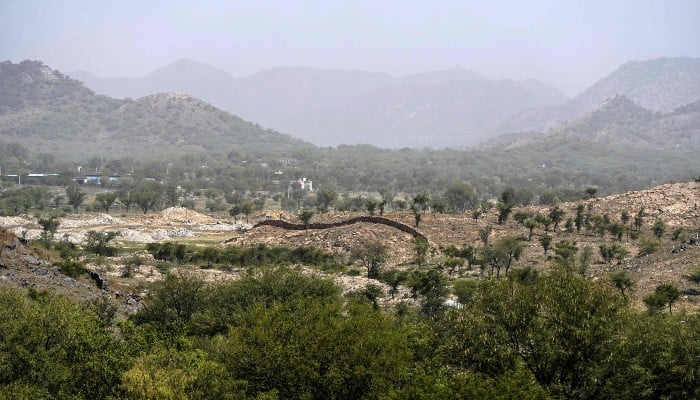 This photograph taken on May 19, 2026, shows the Aravalli mountain range in the backdrop at Ramlyawas village in Rajasthan´s Neem ka Thana town. — AFP