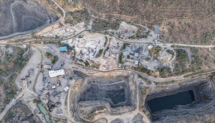 This aerial photograph, taken on May 18, 2026, shows an open-cast stone quarry in the Aravalli mountain range in Rajasthan´s Neem ka Thana town. — AFP