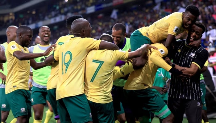 South Africas Evidence Makgopa celebrates scoring their third goal with teammates against Rwanda in Fifa World Cup CAF Qualifiers at Mbombela Stadium, Mbombela, South Africa - October 14, 2025. — Reuters