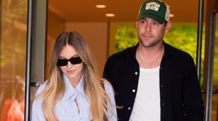 Sydney Sweeney holds hands with Scooter Braun during latest outing 