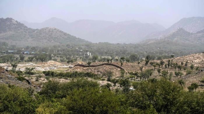 Mining turns India's heat-shield hills to dust
