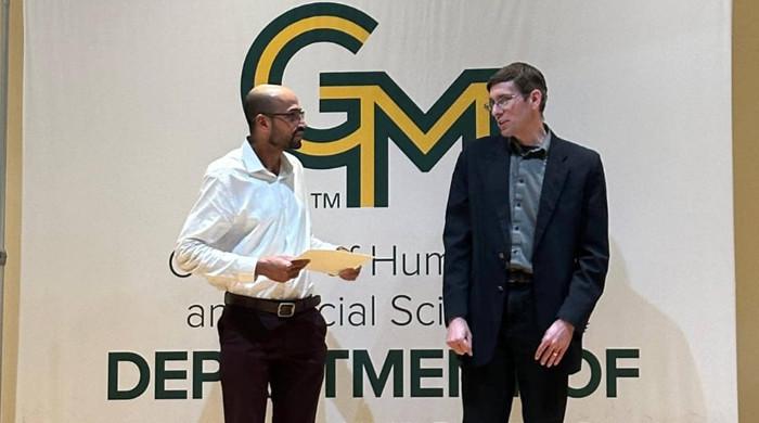US university honours Pakistani academic for excellence in science communication