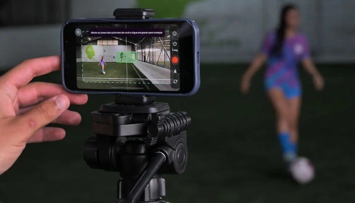 Brazilian football player Marcela Geremias de Lima is filmed performing football drills for the CUJU app. — AFP