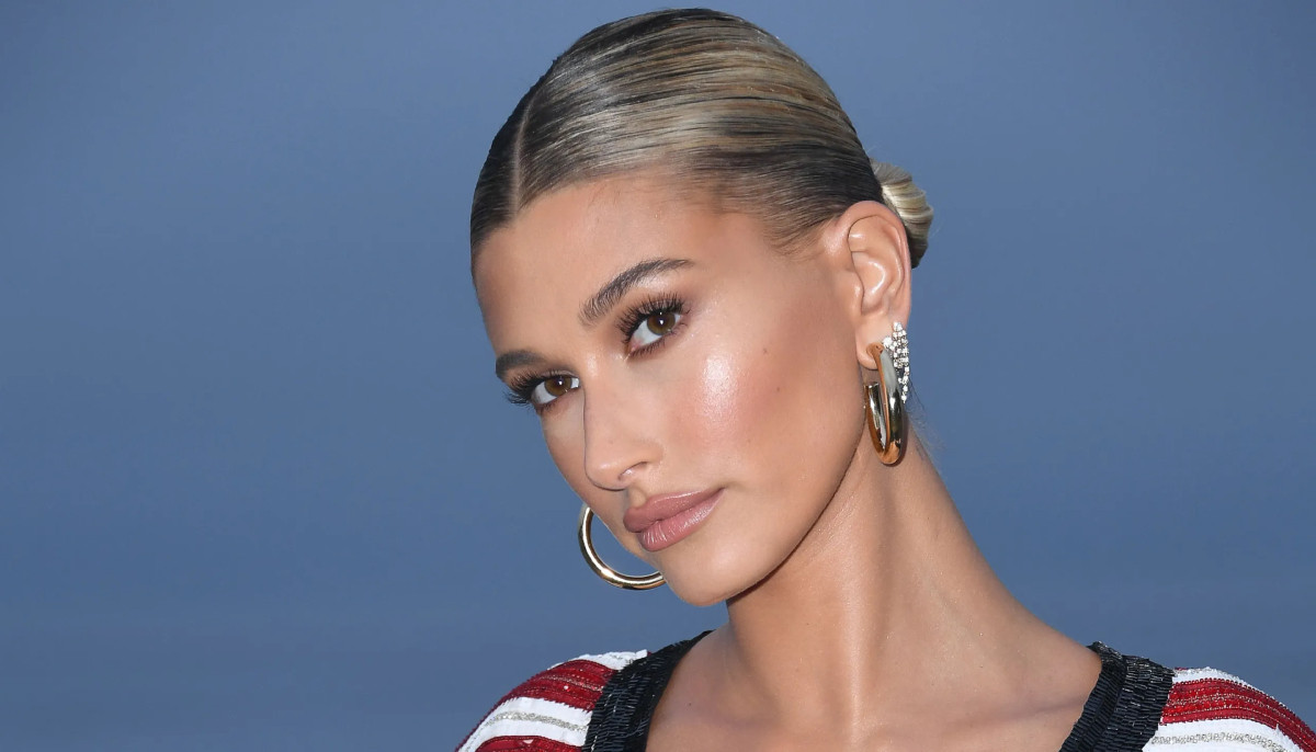Hailey Bieber exhibits new baby tattoo