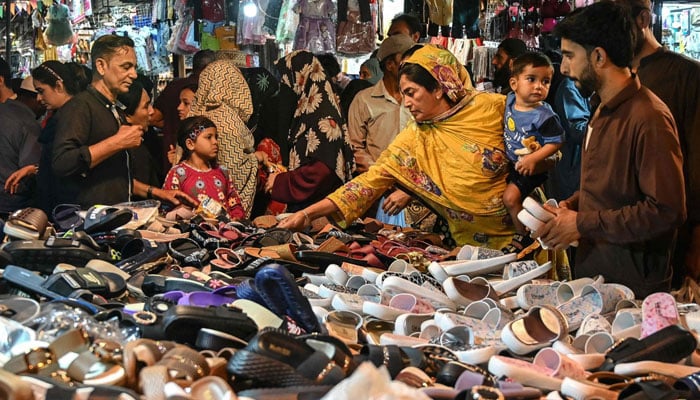 People visit local markets to shop ahead of Eid ul Fitr, March 16, 2026. — APP