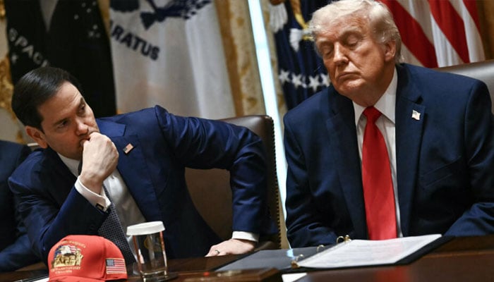 US Secretary of State Marco Rubio (centre) and US President Donald Trump (right) listen during a cabinet meeting in the Cabinet Room of the White House in Washington, DC, on May 27, 2026. — AFP