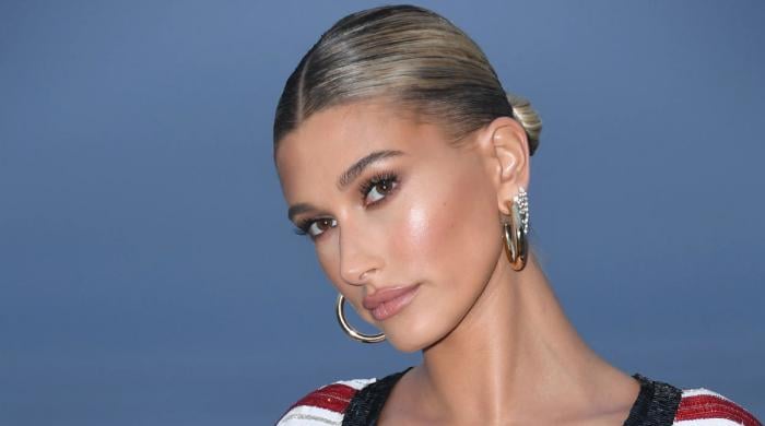 Hailey Bieber exhibits new baby tattoo