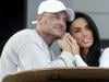 Katie Price refuses to give up on marriage as she flies to meet jailed husband