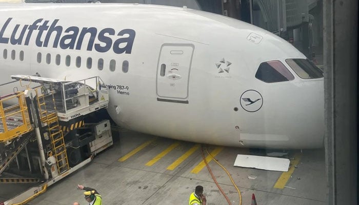 A Lufthansa Boeing is surrounded by ambulances and other emergency vehicles after several staff members were injured when the nose gear of a Boeing 787 jetliner unexpectedly collapsed at a gate at Frankfurt Airport, according to Lufthansa, in Frankfurt, Germany, June 4, 2026. — X/@aviationbrk