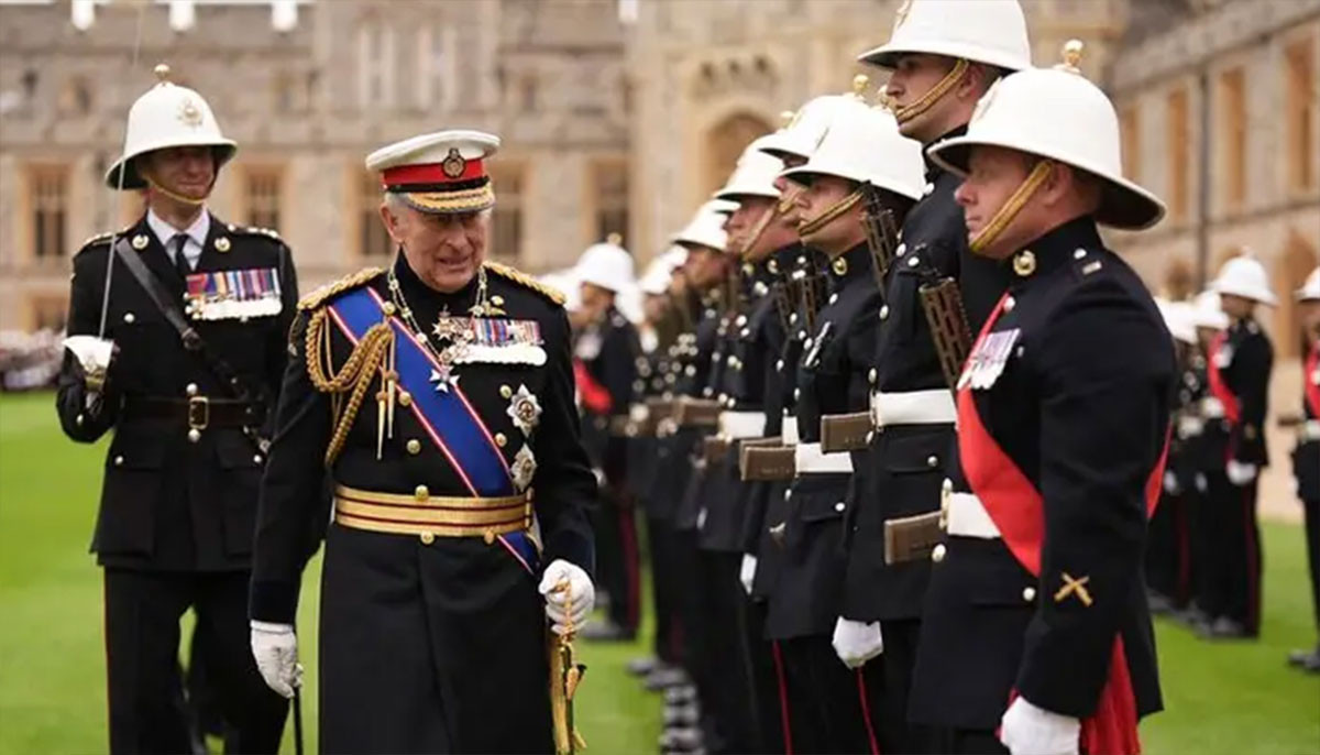 King Charles inspects marines in first ever four-unit colours ceremony