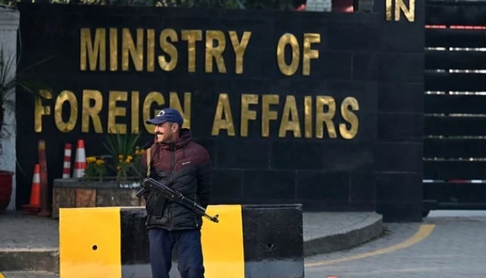 A Pakistani police officer stands guard outside the Ministry of Foreign Affairs in Islamabad on January 18, 2024. — AFP