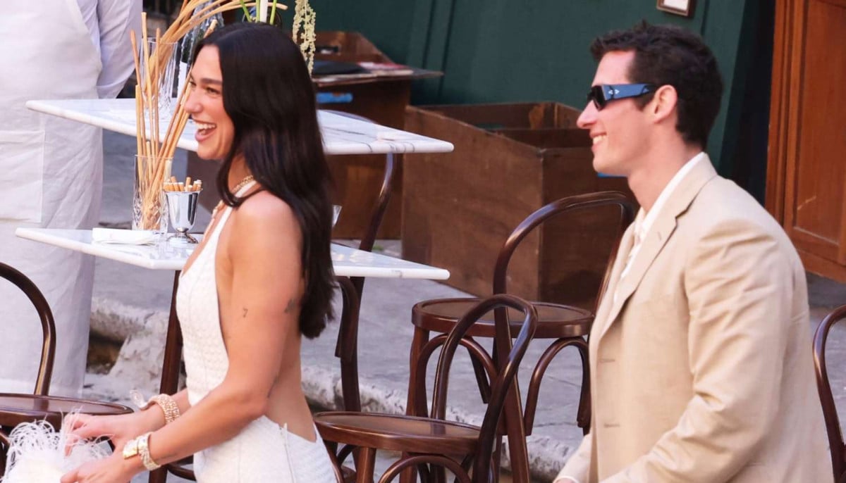 Newlywed Dua Lipa and husband Callum Turner attend wedding guests in Italy