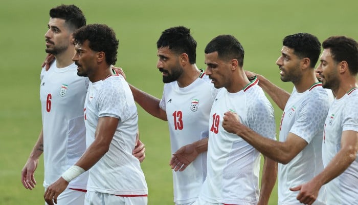 Irans Forward #23 Ramin Rezaeian celebrates with teammates after scoring their sides second goal during an international friendly football match between Iran and Gambia, in Antalya, southern Turkey, May 29, 2026. — AFP