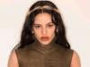 Rosalía lands in Barcelona as cancellation theories swirl online