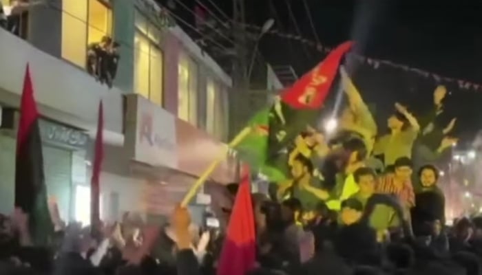PPP supporters celebrate in Skardu after unofficial results declare the partys candidate winner. — Screengrab via Geo News Live