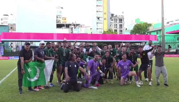 Pakistans football team players celebrate victory against Afghanistan in the Diamond Jubilee International Football Tournament in the Maldives on June 7, 2026. — Reporter
