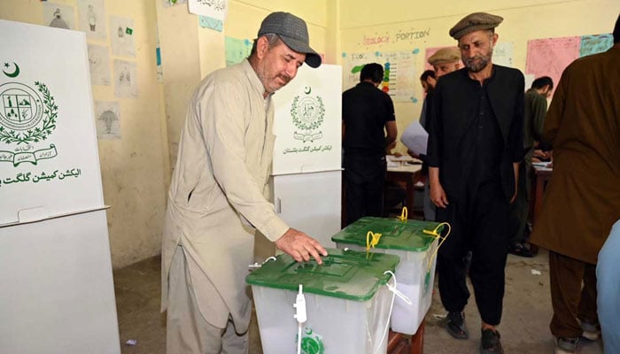 A voter casts his vote at a polling station during the Gilgit-Baltistan General Elections on June 7, 2026. — APP