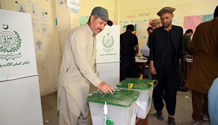 A voter casts his vote at a polling station during the Gilgit-Baltistan General Elections, June 7, 2026. — APP