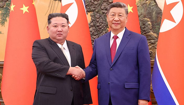 Chinese President Xi Jinping and Democratic Peoples Republic of Korea (DPRK) leader Kim Jong Un shake hands at the Great Hall of the People in Beijing, China September 4, 2025.— Reuters/File