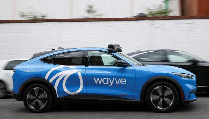 A Wayve autonomous car drives through a residential street during a technology demonstration as the self-driving start-up prepares to announce plans to launch autonomous rides on Uber, in London, Britain, June 5, 2026.— Reuters