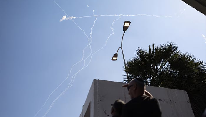 Interception contrails in the sky after Iran launched missiles towards Israel, as seen from central Israel, June 8, 2026. — Reuters